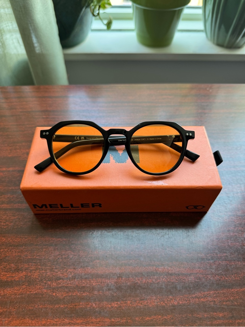 Meller Women's Black Frame Sunglasses with Amber Lenses